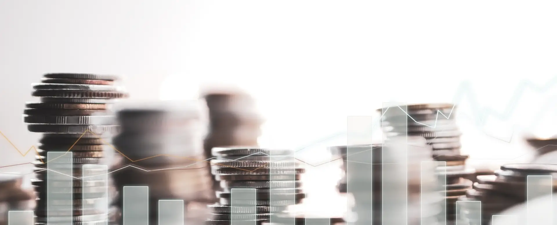Stacks of coins with translucent bar graphs overlayed, symbolizing financial growth from mortgage refinance or home loans.