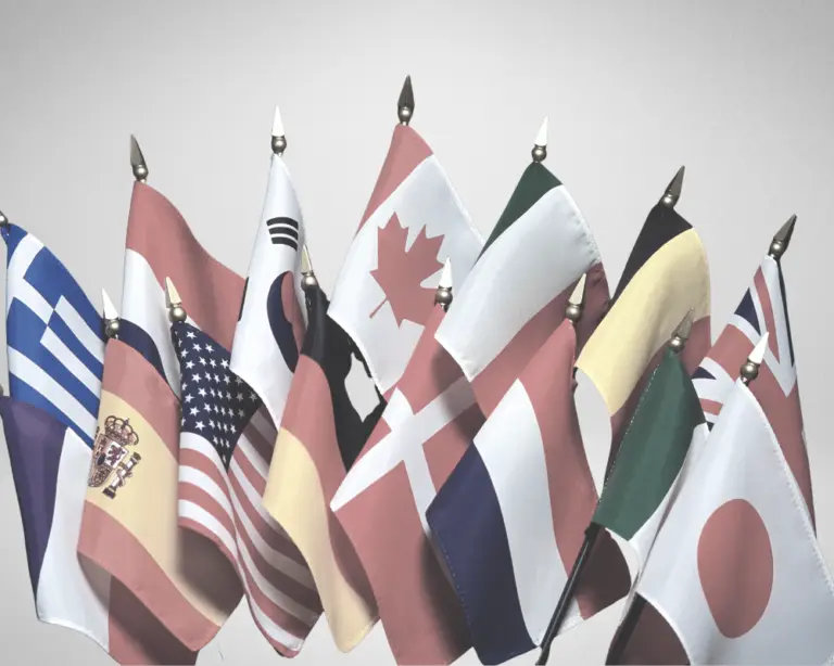 A group of various national flags, like Greece and Japan, displayed together—perfect for first-time home buyers worldwide.
