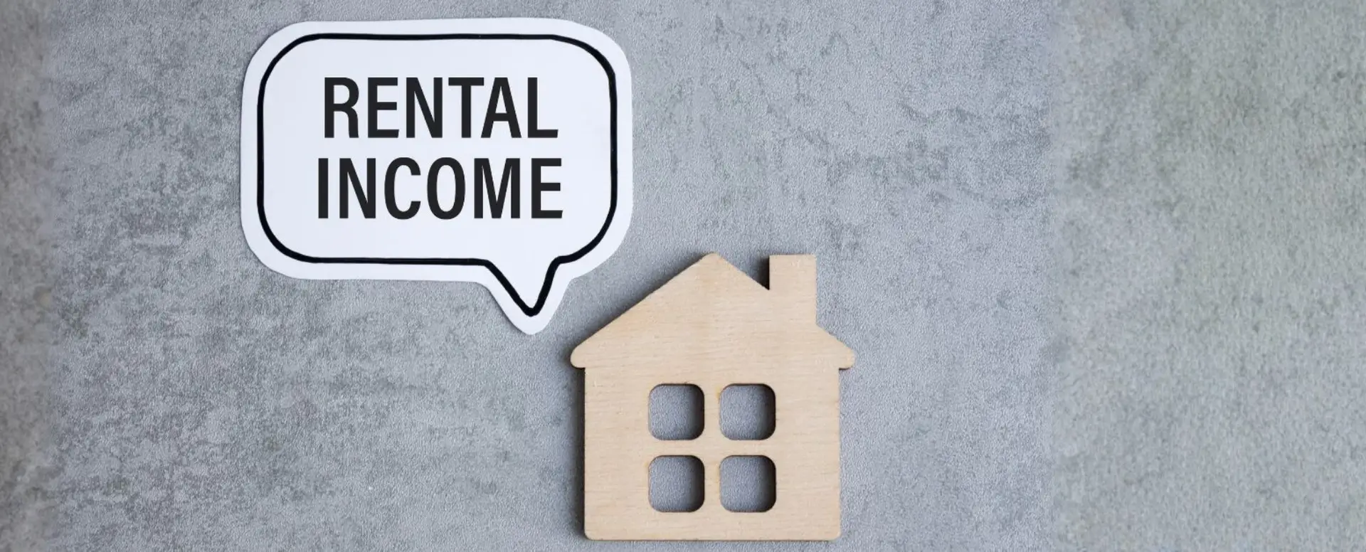 A speech bubble saying RENTAL INCOME next to a wooden house icon, ideal for mortgage lender promotions.